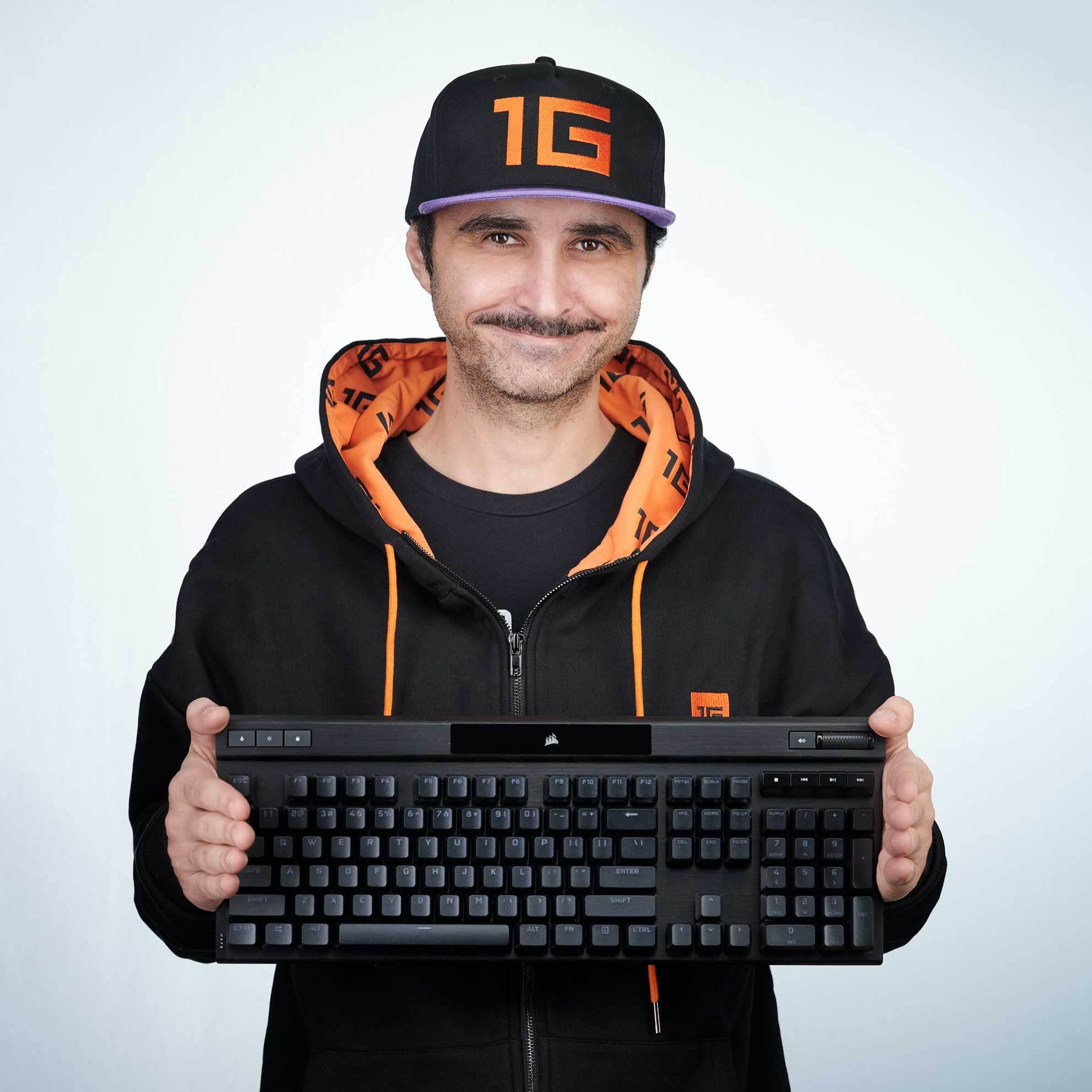 CORSAIR-sponsored pro gamer Summit1G smiles confidently.