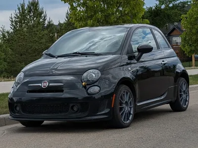 Fun city car. Budget under $6K.