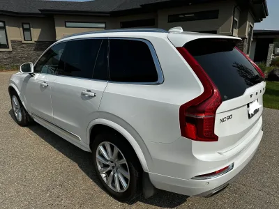 Sourcing Volvo XC90 for a family resale project. Must have third-row seating, working infotainment system, and preferably beige or black interior. 2016 or newer, under 160K km.