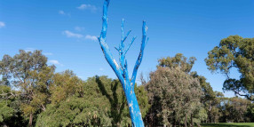 Town Plants Seeds of Mental Health Awareness with Blue Trees