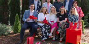 TRC, Empire Theatres unveil red bench; to collect red shoes for charity auction in aid of family vio…