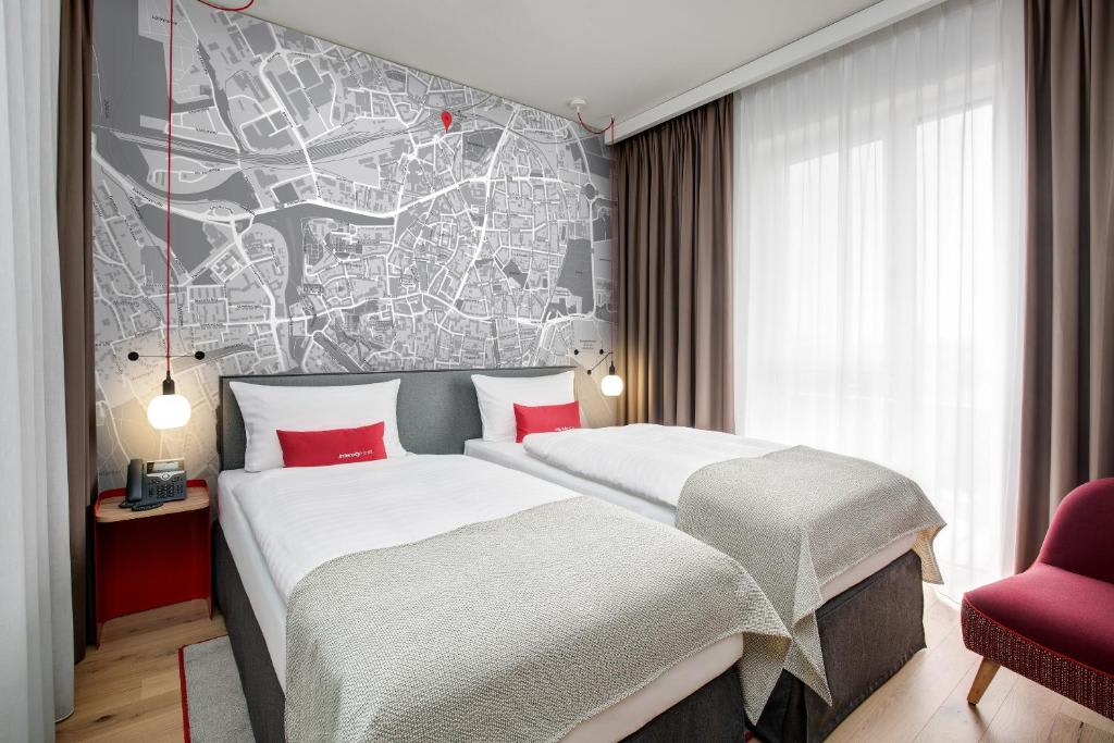 Business Zimmer mit separaten Betten – IntercityHotel Dortmund