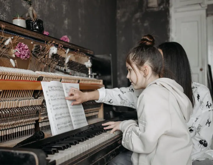 Girl student Learning piano Photo by Pavel Danilyuk