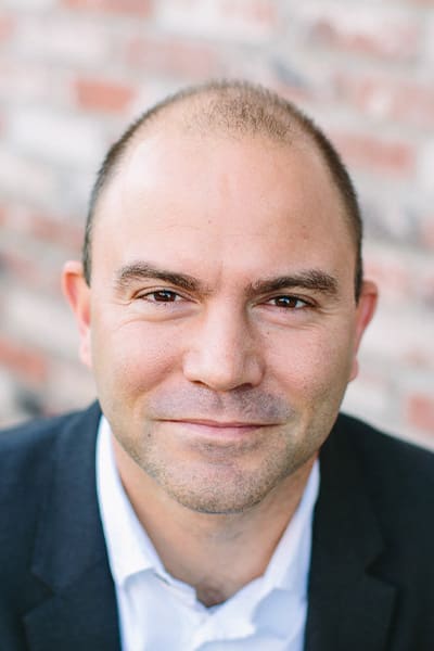 headshot image of Ben Rhodes