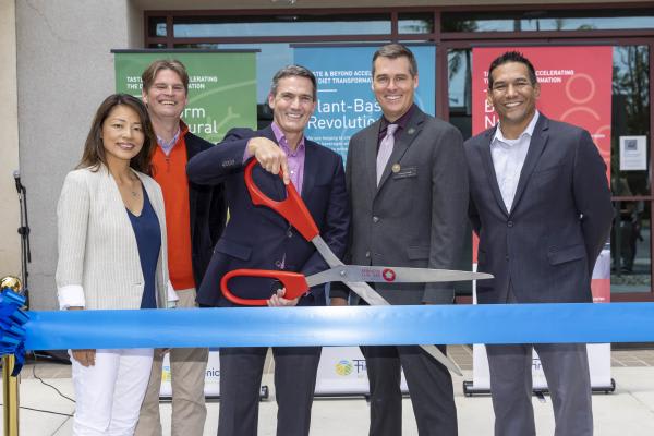 California Team Cutting Ribbon