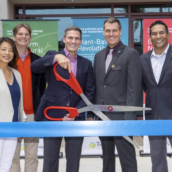 California Team Cutting Ribbon