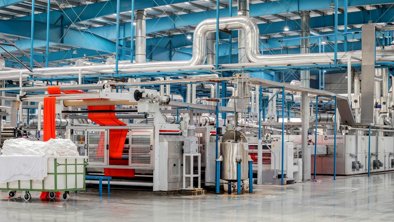 Machinery and pipework inside a textile finishing plant