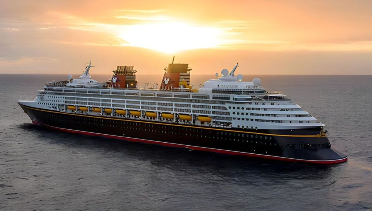 Disney Wonder cruise ship sailing into the sunset
