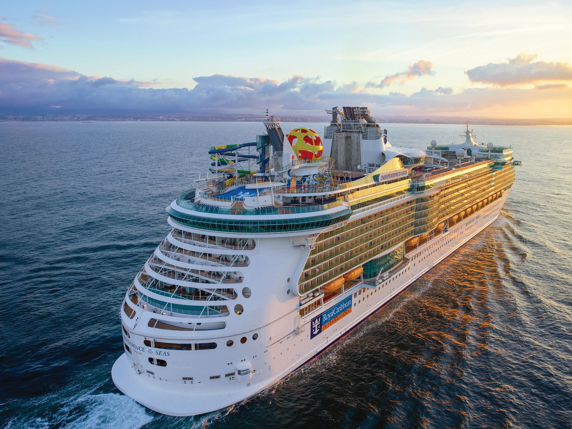 Aerial image of Independence of the Seas cruising forward in the Bahamas.