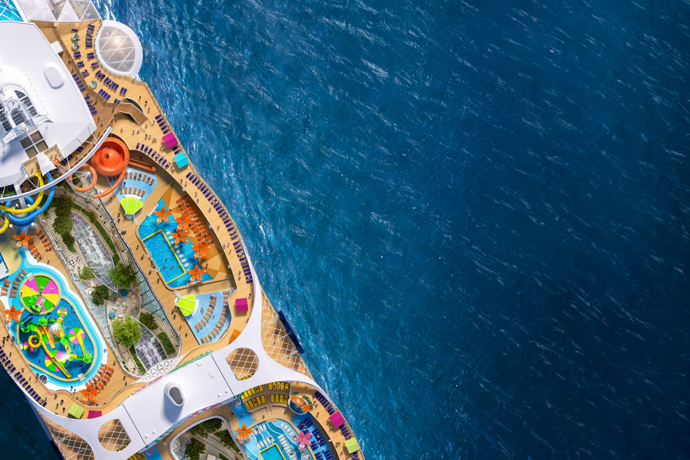 Aerial view of Royal Caribbean's Utopia of the Seas with water slides and pools, vibrant deck activities, and the open sea.