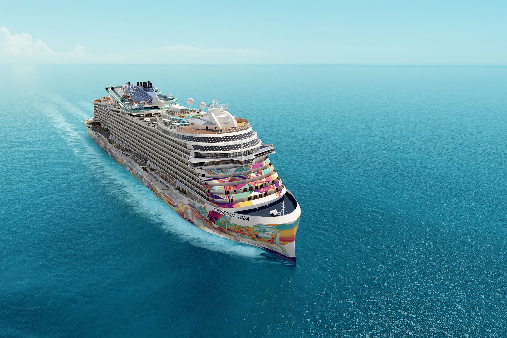 Norwegian Aqua cruise ship sailing in the open ocean, displaying colorful hull art.