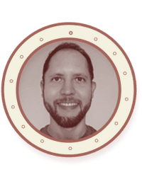 A sepia-toned portrait of Jorge, Cruisebound's backend developer, framed in a circular porthole design with a red accent border, smiling warmly against a plain background.