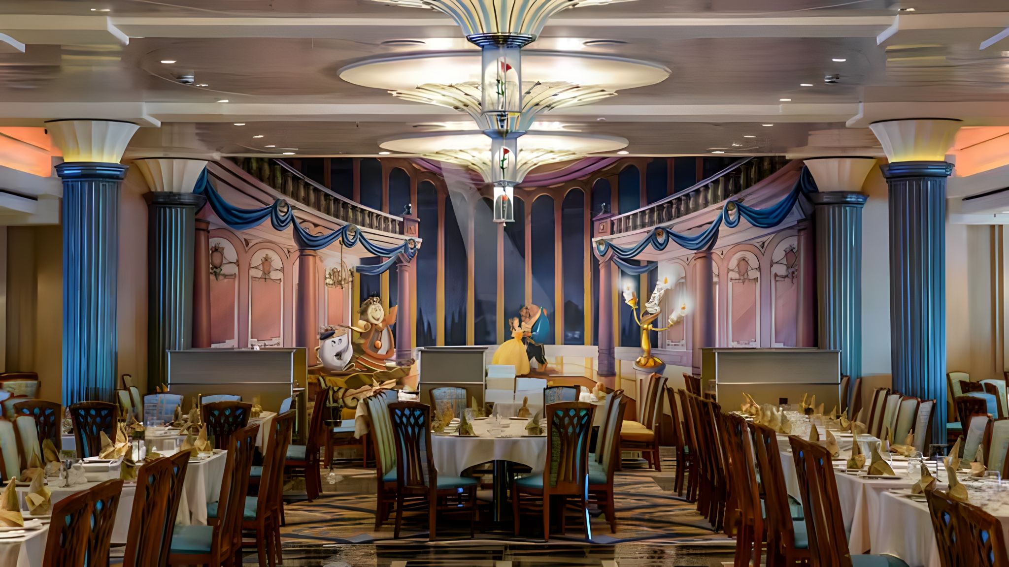 Elegant character dining area aboard Disney Cruise Line's Lumière's restaurant, featuring Beauty and the Beast themed decor with characters and luxurious table settings.
