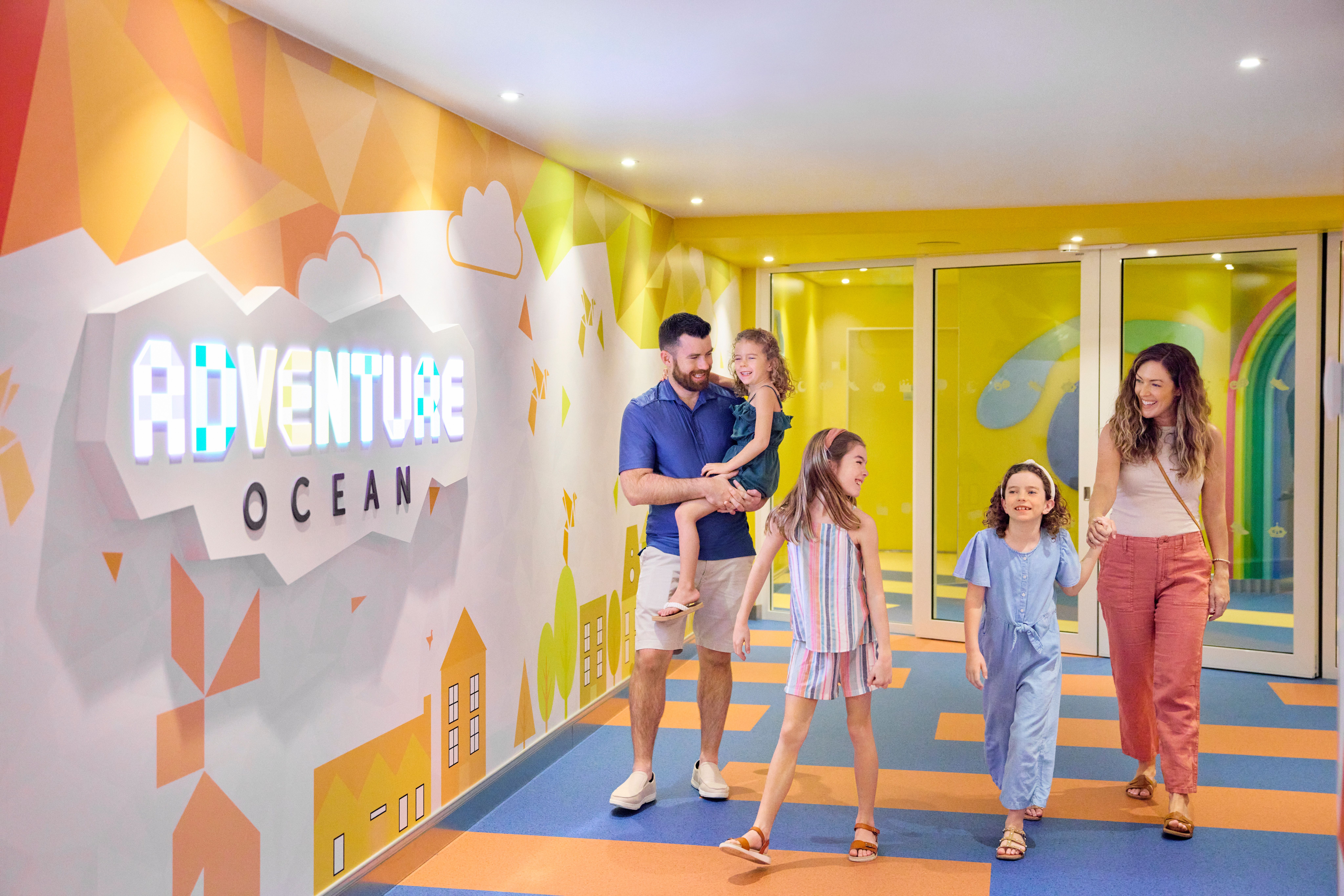 Family walking past Adventure Ocean kids club on Legend of the Seas