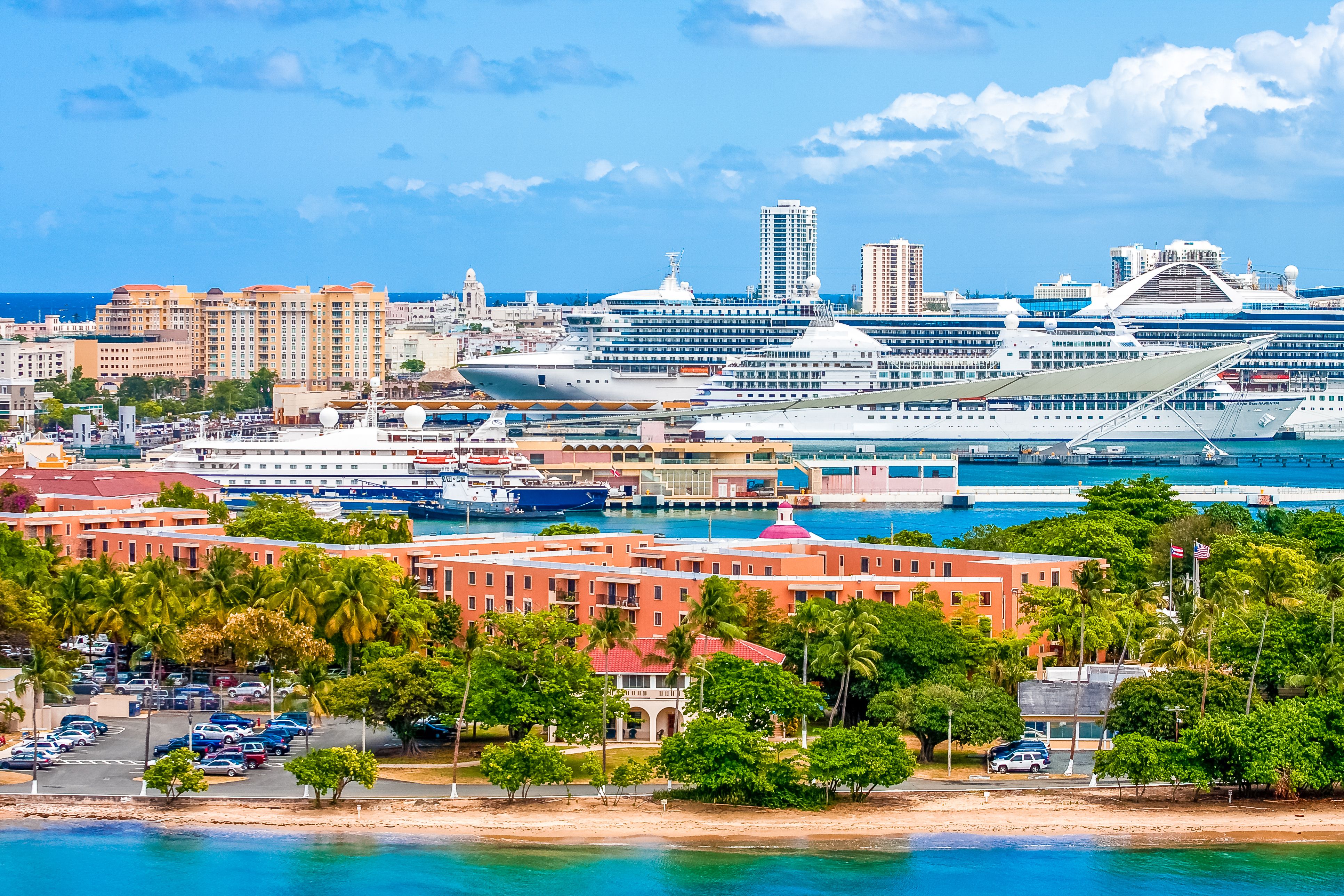 Cruise ships docked at San Juan cruise port with Old San Juan's colorful buildings and skyline