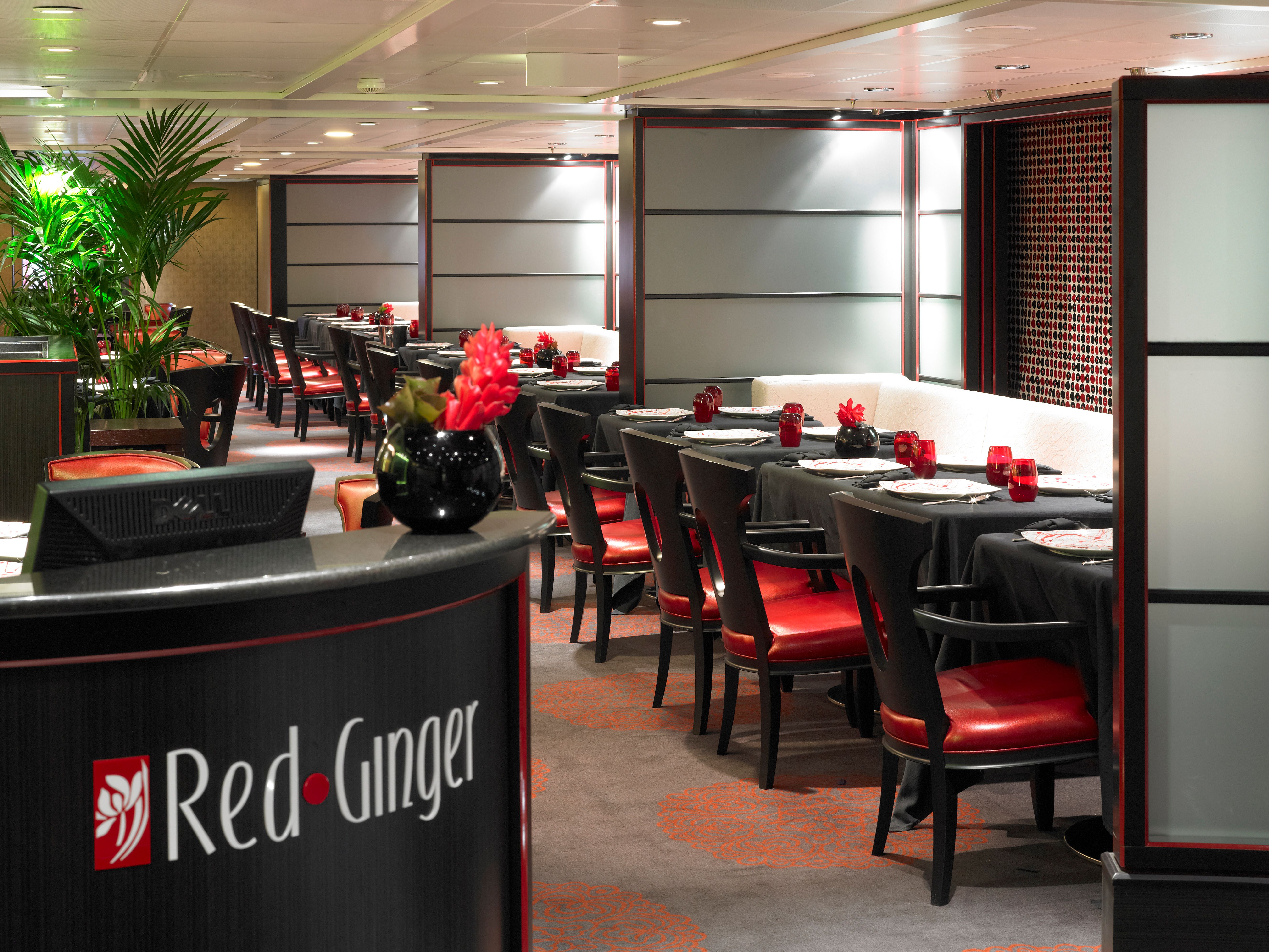 Red Ginger restaurant on Oceania Cruises, featuring Asian-inspired décor, red accents, and elegant table settings for refined Pan-Asian dining at sea.