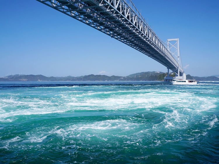 Tokushima, Japan &ndash; Suspension bridge above powerful swirling sea currents