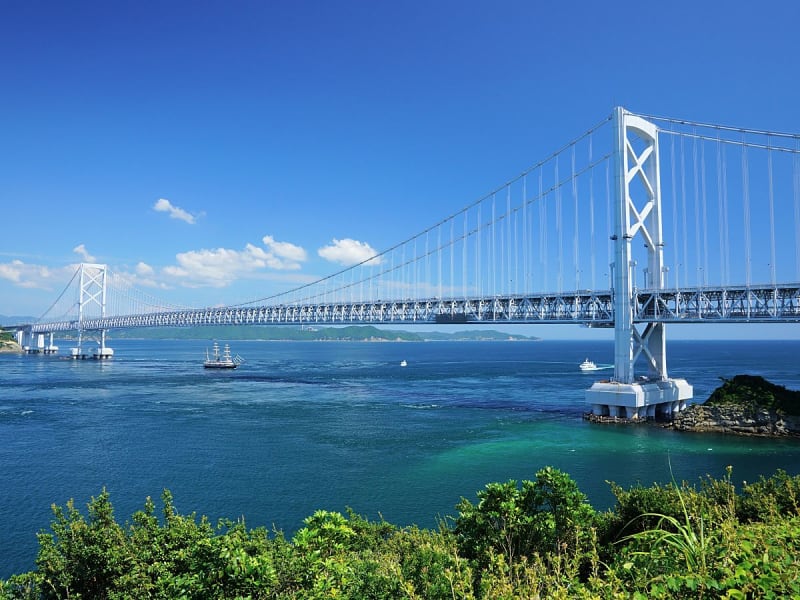 Tokushima, Japan &ndash; Large suspension bridge spanning deep blue waters