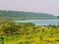 Luganville, Vanuatu – Groene kust met palmbomen en helder water