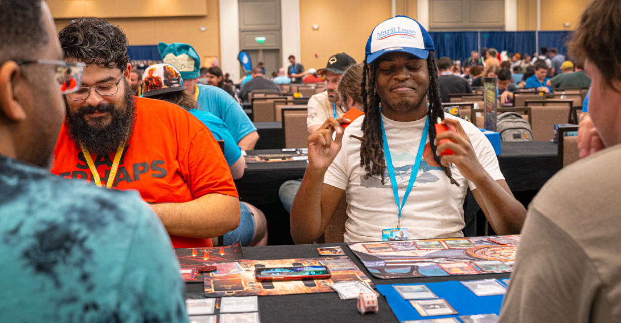 A large group of people playing Magic at a CommandFest event.