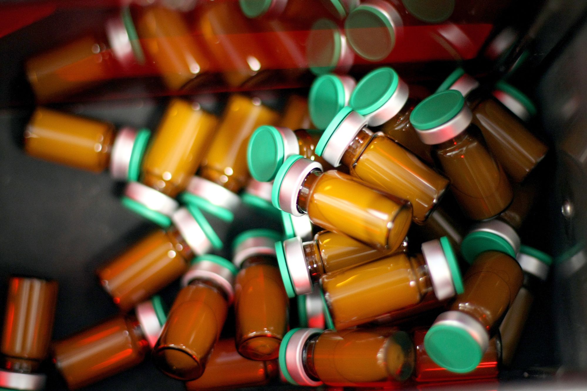 A picture shows vials of Humenza and Panenza, H1N1 flu vaccines by the Sanofi-Pasteur manufacturer on October 19, 2009 in Val-de-Reuil, western Paris. A picture shows vials of Humenza and Panenza, H1N1 flu vaccines by the Sanofi-Pasteur manufacturer on October 19, 2009 in Val-de-Reuil, western Paris.
