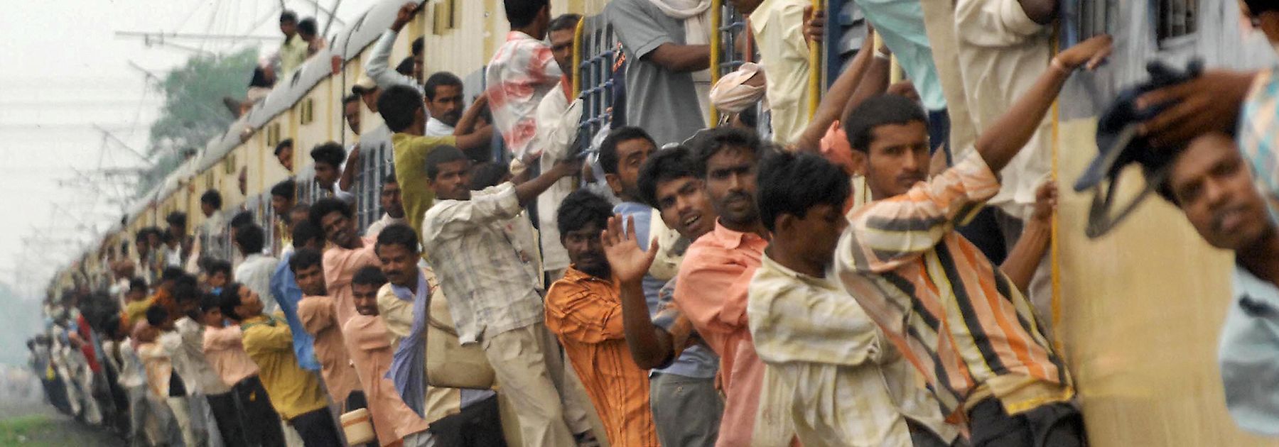 Commuters overcrowd a local passenger train on the Patna-Gaya railway track in Patna. (STR/AFP/Getty Images) Commuters overcrowd a local passenger train on the Patna-Gaya railway track in Patna. (STR/AFP/Getty Images)