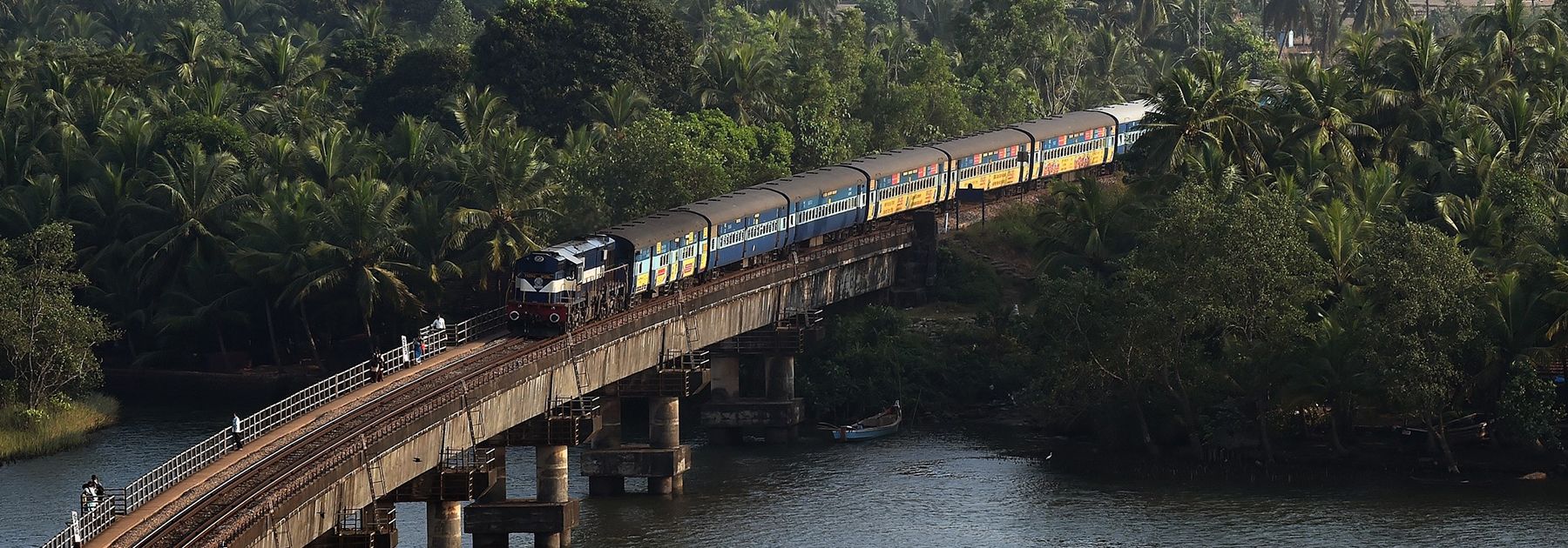 An Indian Railways diesel locomotive carrying a passenger train on Sherawati bridge in Karnataka. (PRAKASH SINGH/AFP/Getty Images) An Indian Railways diesel locomotive carrying a passenger train on Sherawati bridge in Karnataka. (PRAKASH SINGH/AFP/Getty Images)