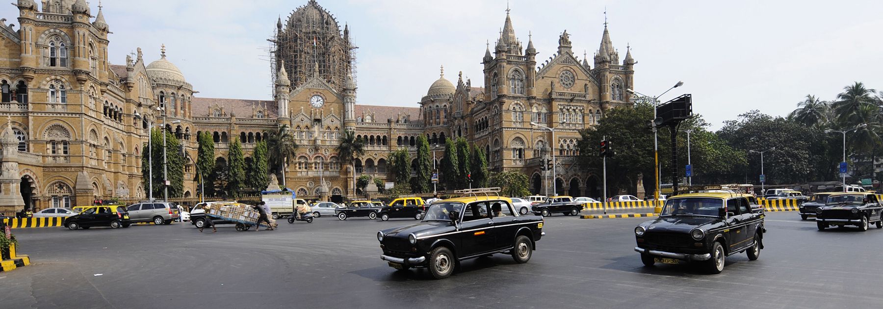 Compressed Natural Gas (CNG) taxis are driven past Chhatrapati Shivaji (Victoria) Terminus train station in Mumbai. (SAJJAD HUSSAIN/AFP/Getty Images) Compressed Natural Gas (CNG) taxis are driven past Chhatrapati Shivaji (Victoria) Terminus train station in Mumbai. (SAJJAD HUSSAIN/AFP/Getty Images)