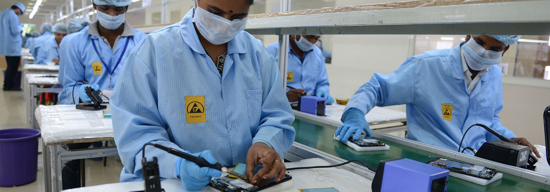 Indian technicians work on tablet computers at Canadian company Datawind Manufacturing plant. (NOAH SEELAM/AFP/Getty Images) Indian technicians work on tablet computers at Canadian company Datawind Manufacturing plant. (NOAH SEELAM/AFP/Getty Images)