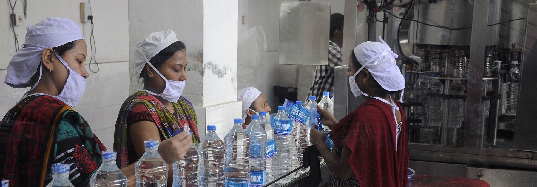 Workers add labels onto bottles of drinking water at a bottling unit on World Water Day in Agartala. (ARINDAM DEY/AFP/Getty Images) Workers add labels onto bottles of drinking water at a bottling unit on World Water Day in Agartala. (ARINDAM DEY/AFP/Getty Images)