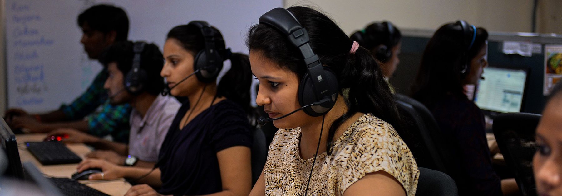 A woman works at a call center of TravelKhana, India’s vast railway network, in Noida. (CHANDAN KHANNA/AFP/Getty Images) A woman works at a call center of TravelKhana, India’s vast railway network, in Noida. (CHANDAN KHANNA/AFP/Getty Images)
