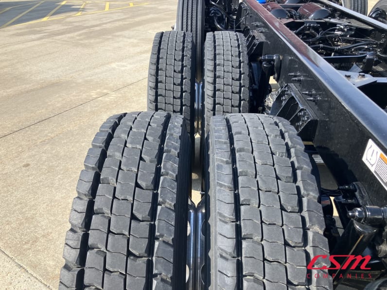 Driver side rear frame and tire tread for this 2025 Kenworth T880 Short Hood (Stock number: SJ154923)