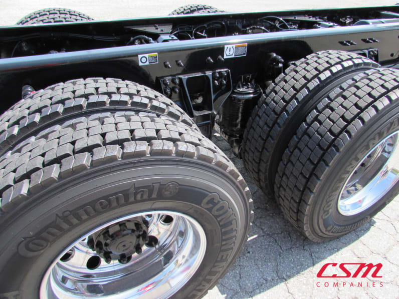Passenger side rear frame and tire tread for this 2025 Kenworth T880 Short Hood (Stock number: SJ173928)