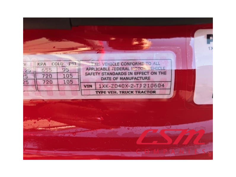VIN tag for this 2026 Kenworth T880 (Stock number: TJ210604)