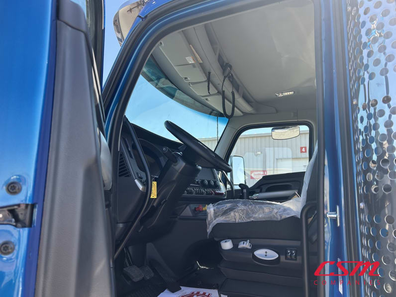Drivers side door open for this 2026 Kenworth T880 (Stock number: TJ210605)