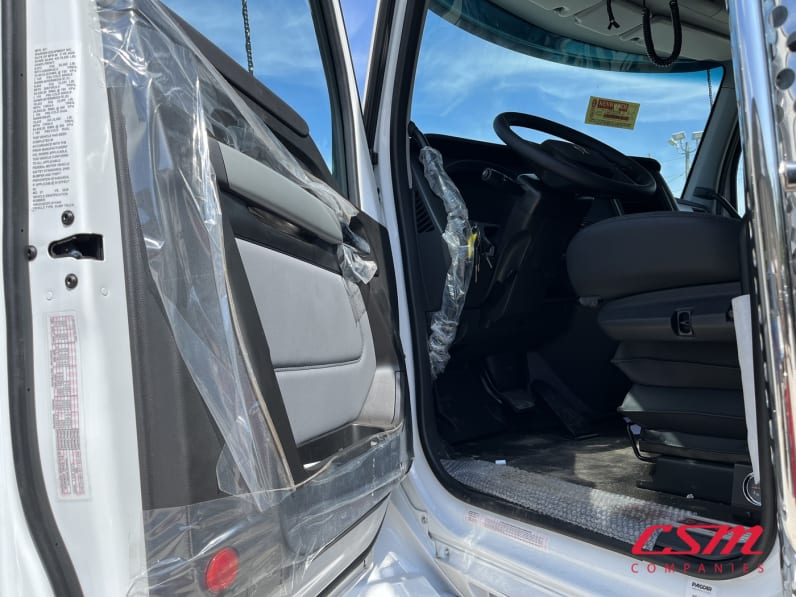 Drivers side door open for this 2026 Kenworth T880 (Stock number: TJ211549)