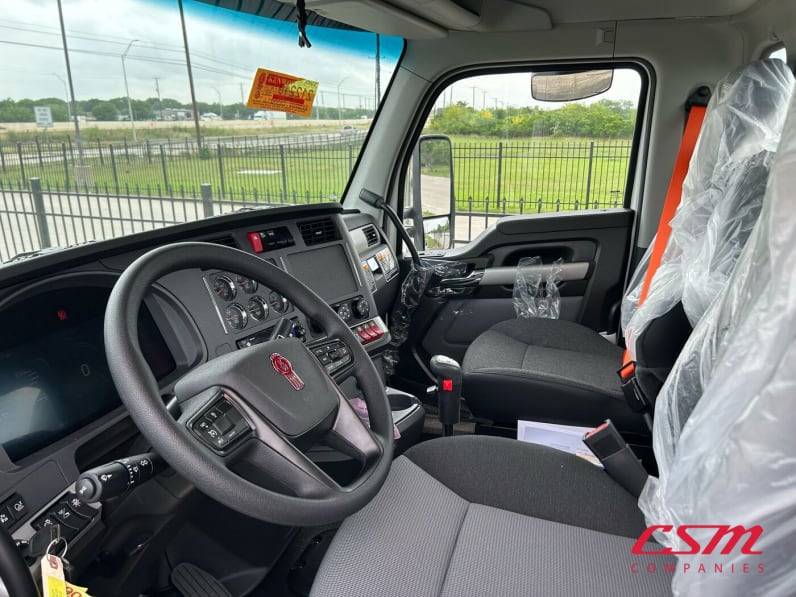 Drivers side door open for this 2026 Kenworth T880 (Stock number: TJ212210)Weeee