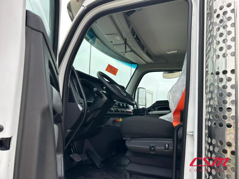 Drivers side door open for this 2026 Kenworth T880 (Stock number: TJ216007)