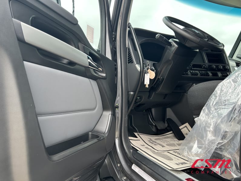 Drivers side door open for this 2026 Kenworth T680 (Stock number: TJ219853)