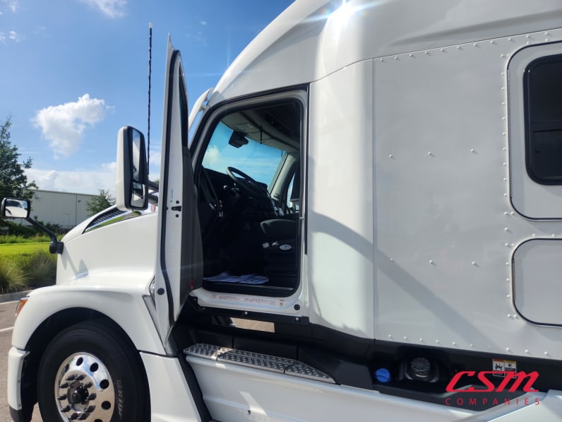 Drivers side door open for this 2026 Kenworth T680 (Stock number: TJ219908)