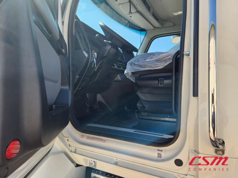 Drivers side door open for this 2026 Kenworth T880 (Stock number: TJ220136)
