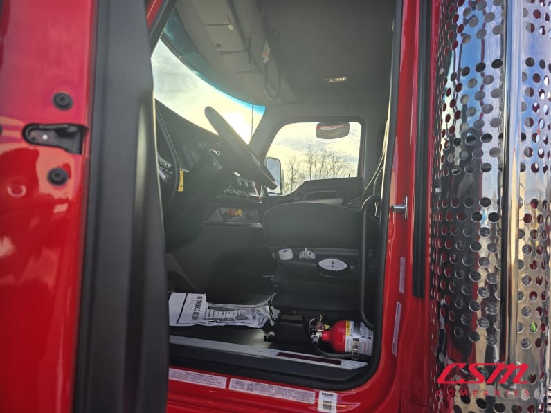 Drivers side door open for this 2026 Kenworth T880 (Stock number: TJ228278)