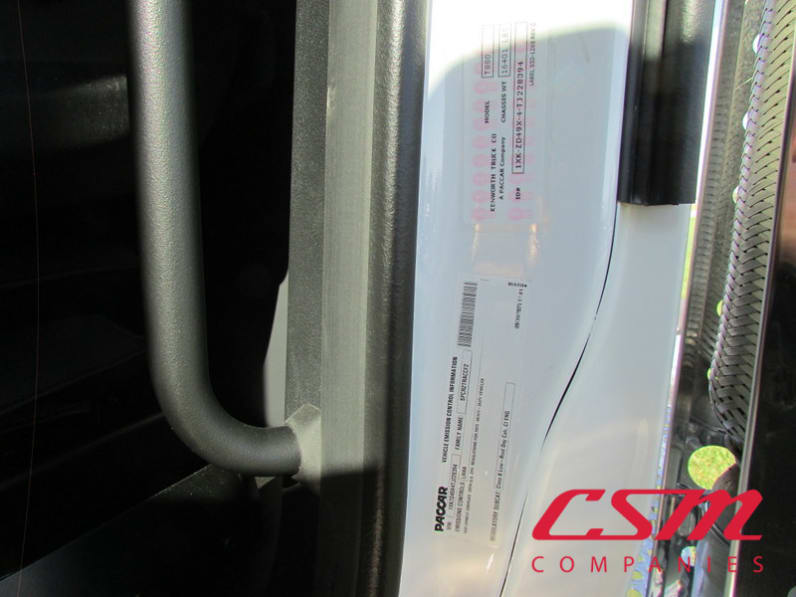 VIN tag for this 2026 Kenworth T880 (Stock number: TJ228394)