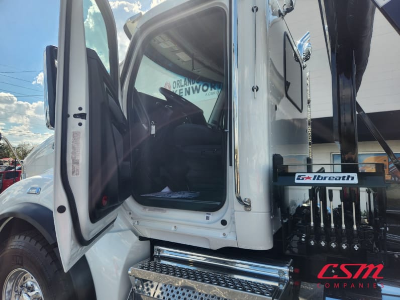 Drivers side door open for this 2026 Kenworth T880 (Stock number: TJ230039)Weeee