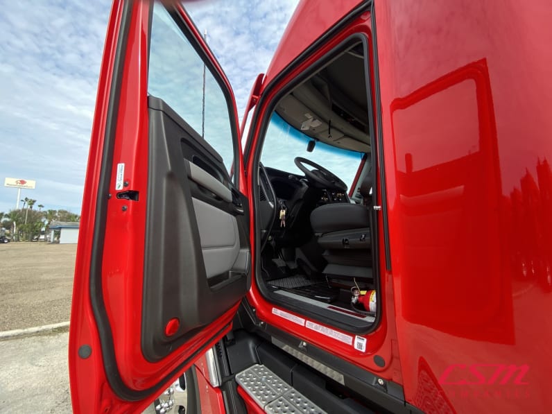 Drivers side door open for this 2026 Kenworth T680 (Stock number: TJ230134)