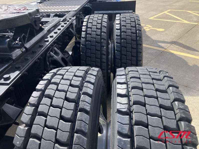 Passenger side rear frame and tire tread for this 2026 Kenworth T680 Short Hood (Stock number: TJ230322)Weeee