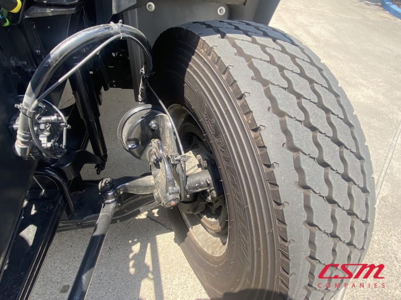 Driver side front tire tread for this 2026 Mack Granite GR64 (Stock number: TM051005)