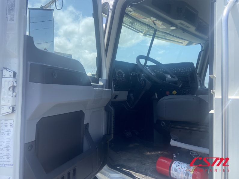 Drivers side door open for this 2026 Mack Granite GR64 (Stock number: TM051005)