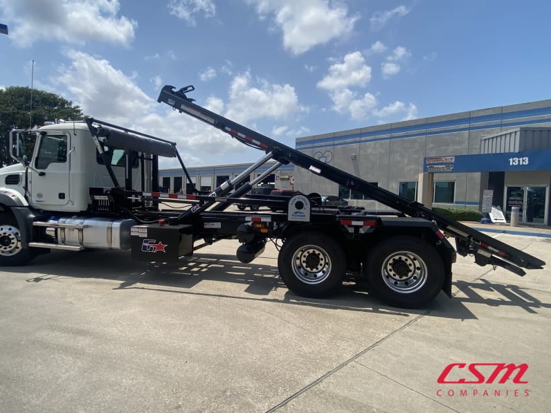 Exterior rear driver side for this 2026 Mack Granite GR64 (Stock number: TM051005)