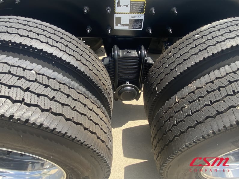 Passenger side rear frame and tire tread for this 2026 Mack Granite GR64 (Stock number: TM051792)